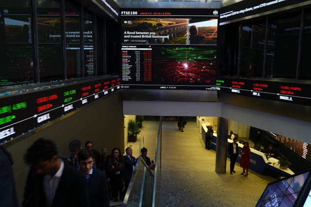 <p>The threat of tariffs from US President Donald Trump continued to weigh heavy on European markets, while screens on Wall Street were a sea of red as trading resumed following Monday’s public holiday (Jonathan Brady/PA)</p>