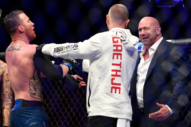 <p>Justin Gaethje (left) with coach Trevor Wittman and UFC president Dana White</p>
