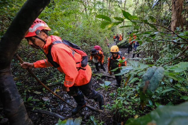 <p>Joint search and rescue teams climb towards the suspected crash site of an Indonesia Air Transport turboprop plane that lost contact a day earlier while flying from Yogyakarta to Makassar, in the Bulusaraung Mountains, South Sulawesi, Indonesia, 18 January 2026</p>