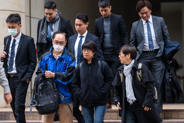 <p>Elizabeth Tang, centre bottom, wife of pro-democracy activist Lee Cheuk-yan, leaves the West Kowloon Magistrates’ Courts following the national security trial of the defunct Hong Kong Alliance in Support of Patriotic Democratic Movements of China, the group that for decades organised the city’s annual 4 June candlelight vigils, on Thursday, 22 January 2026</p>