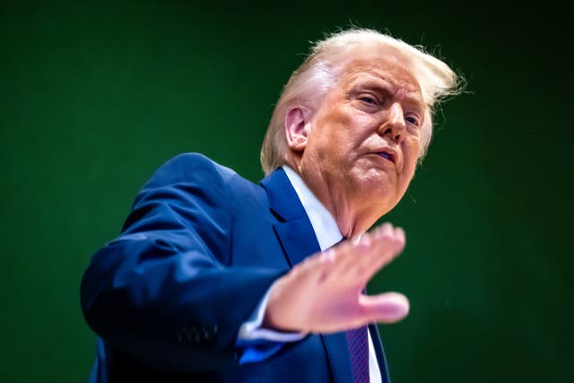 <p>Donald Trump insisted people are ‘happy with me’ at the start of his address in Davos</p>